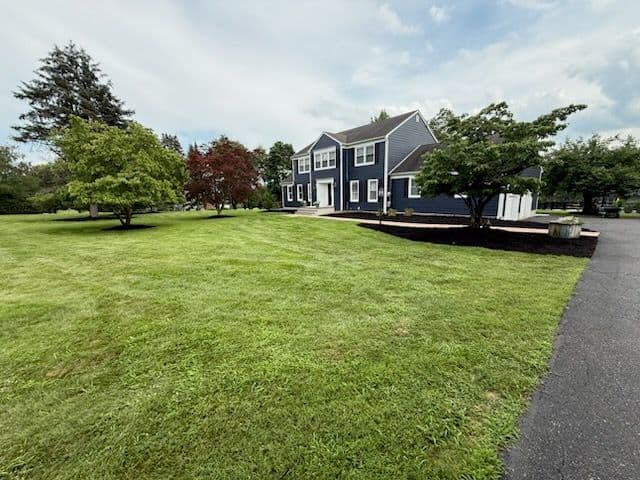 Gallery photos for Backyard Transformation with Black Mulch and Grasses: Image #2